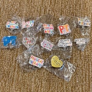 Physical Therapy badge reels- set of 12. New in bag